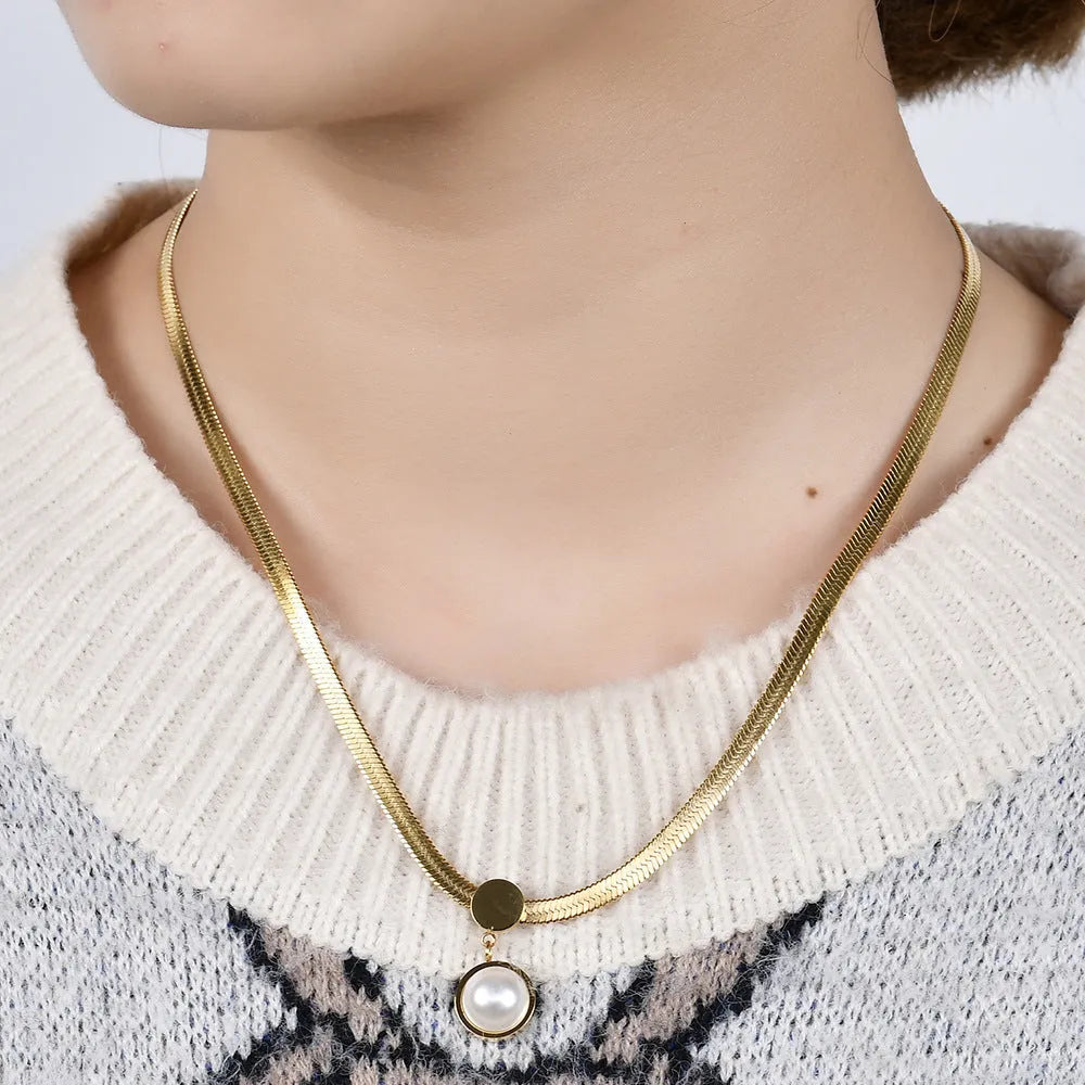 8mm titanium steel flat snake blade necklace in gold colour on a white background