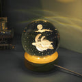 Transparent crystal ball night lamp with carved 3D jellyfish design, USB powered with optional natural light base