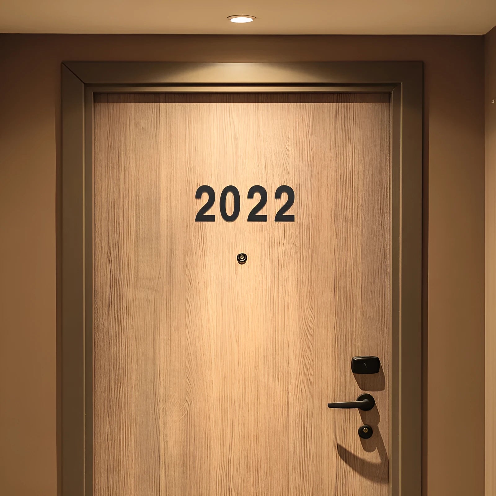 Black stainless steel self-adhesive house number measuring 7.5cm tall with waterproof outdoor performance