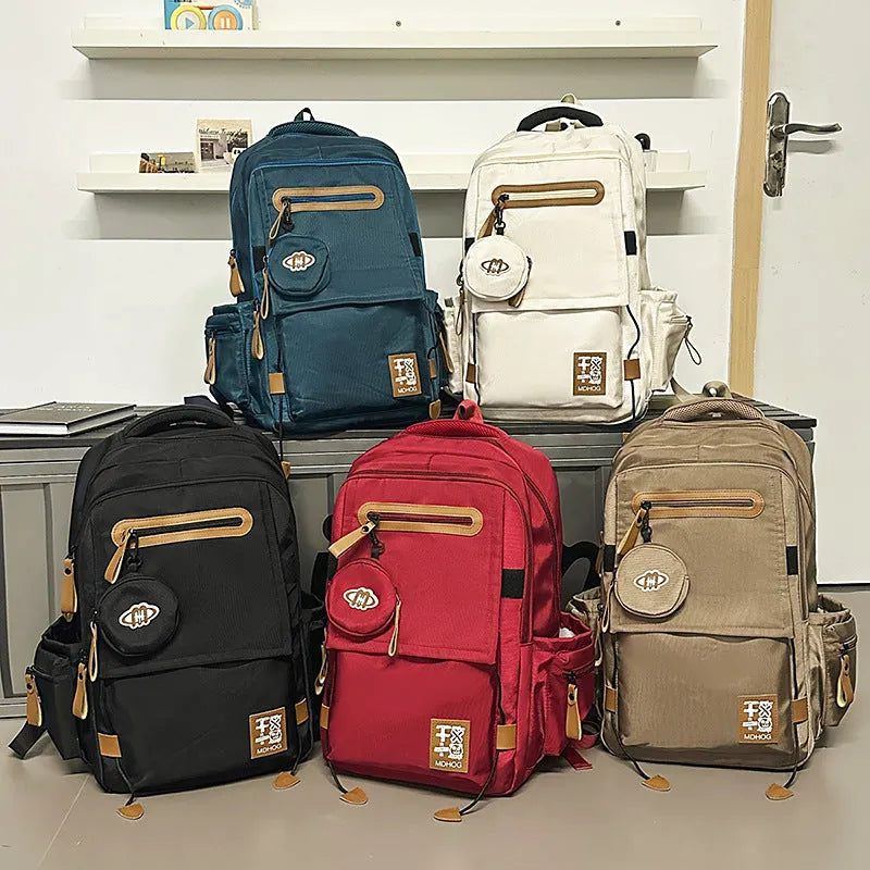 Large waterproof nylon travel backpack with contrast stitching in various colour options