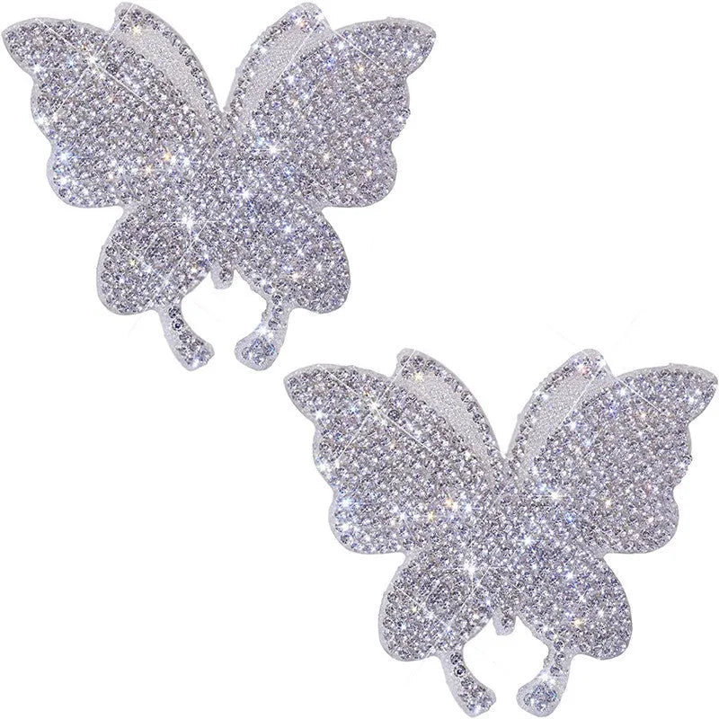 Glass diamond-encrusted car sticker in bear paw or butterfly design, measuring 7cm by 6cm.