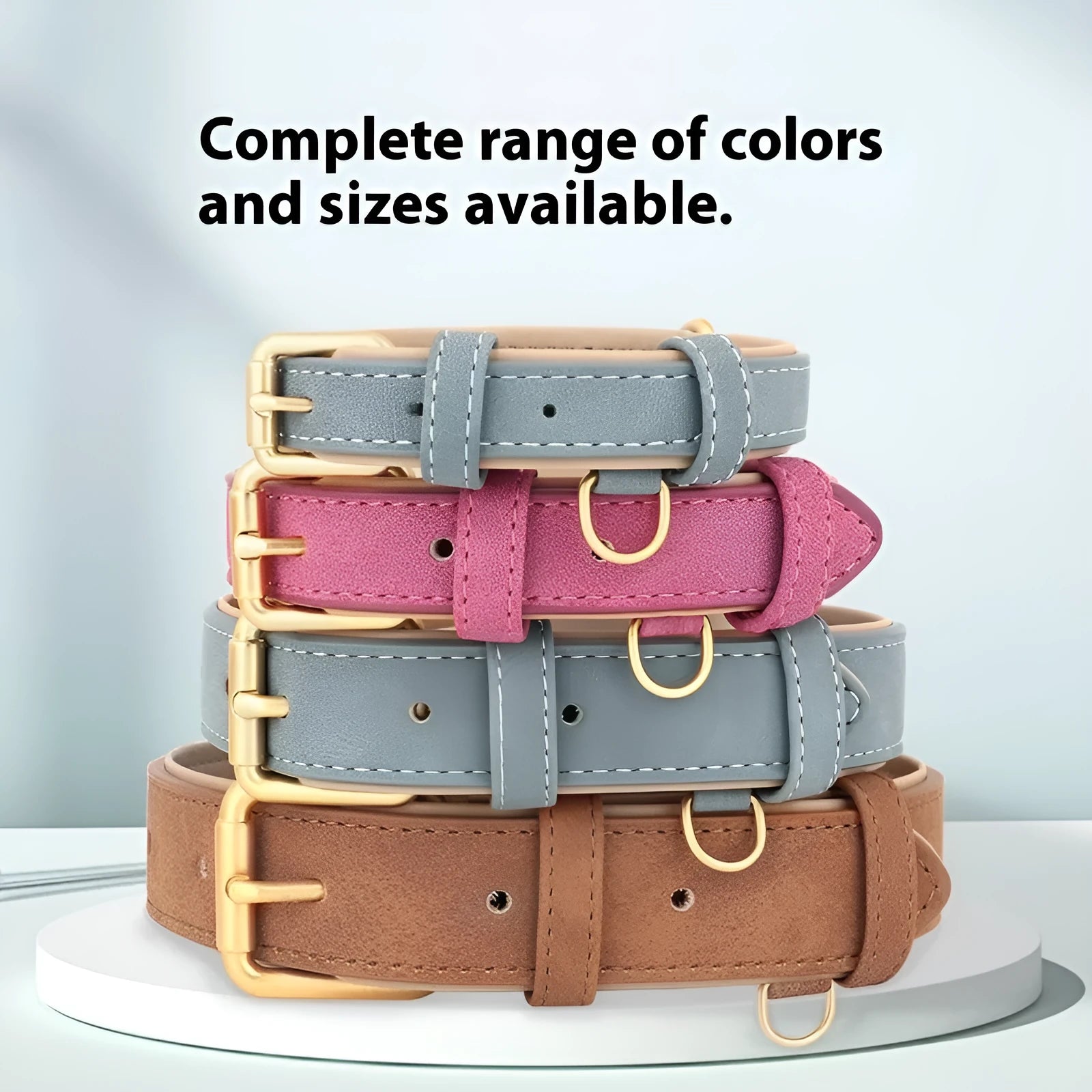 A blue double-layer leather dog collar with a matching leash on a white background.