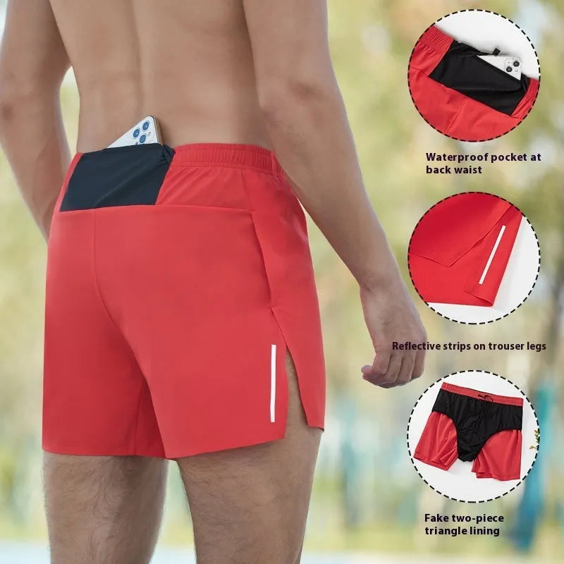 Man wearing navy blue high-waist off-road running shorts with a loose, breathable cut during a run.