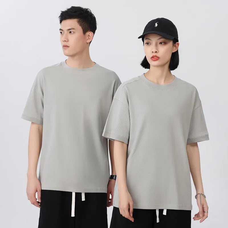 Men's loose fit cotton short-sleeve T-shirt on a hanger in ivory white