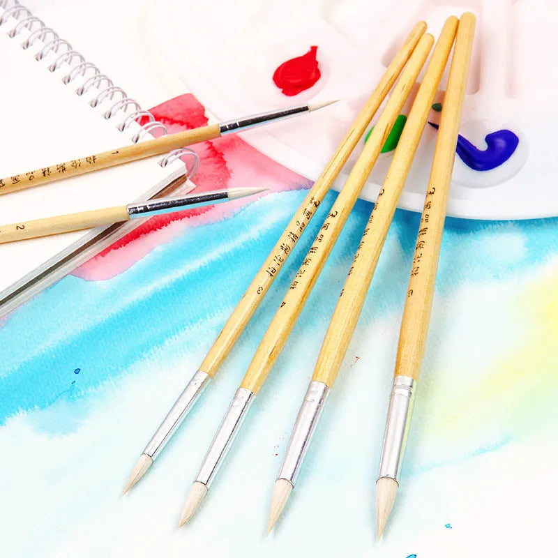 Six wooden-handled artistic wool pointed hook brushes in conventional colours for textile work