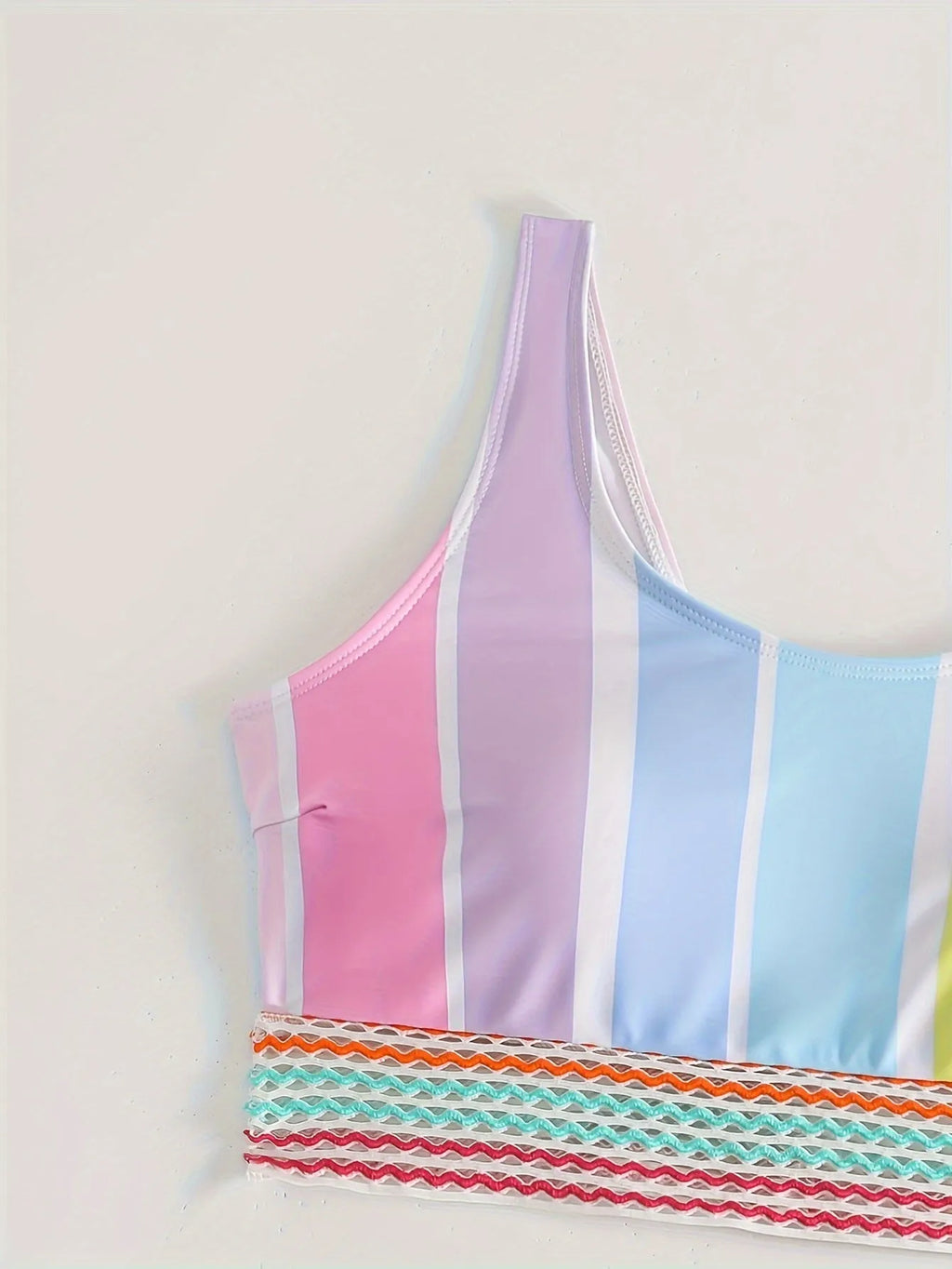 Women's striped bikini set in picture colour, showing top and briefs for swimming sports.