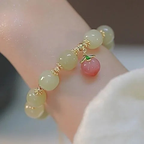 Handmade Chinese national style bracelet with peace buckle clasp and coloured glass rabbit charm
