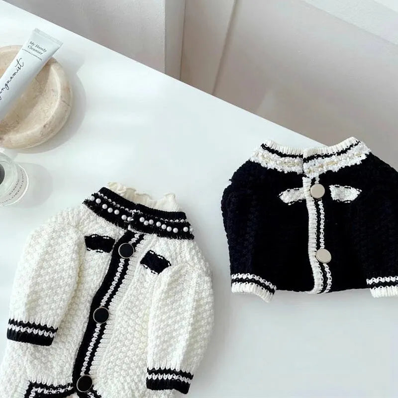Korean style white dog sweater with pearl collar on a small dog, showing princess cut and lightweight polyester fabric.