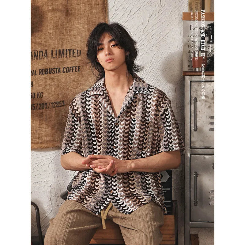 Grey short sleeve Cuban collar shirt with jacquard pattern, shown on a model.