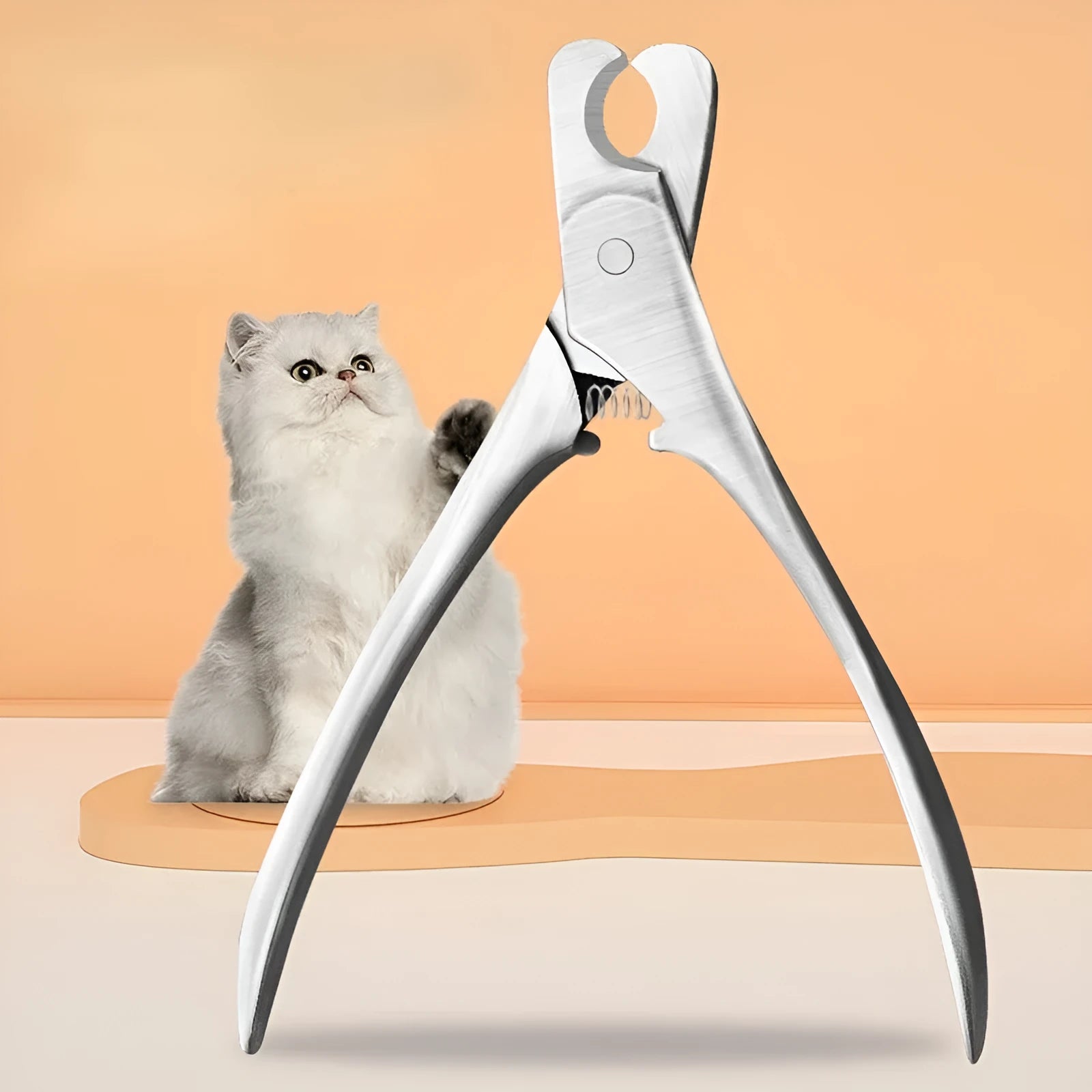 Silver stainless steel professional pet nail clipper for dogs and cats on a plain background.