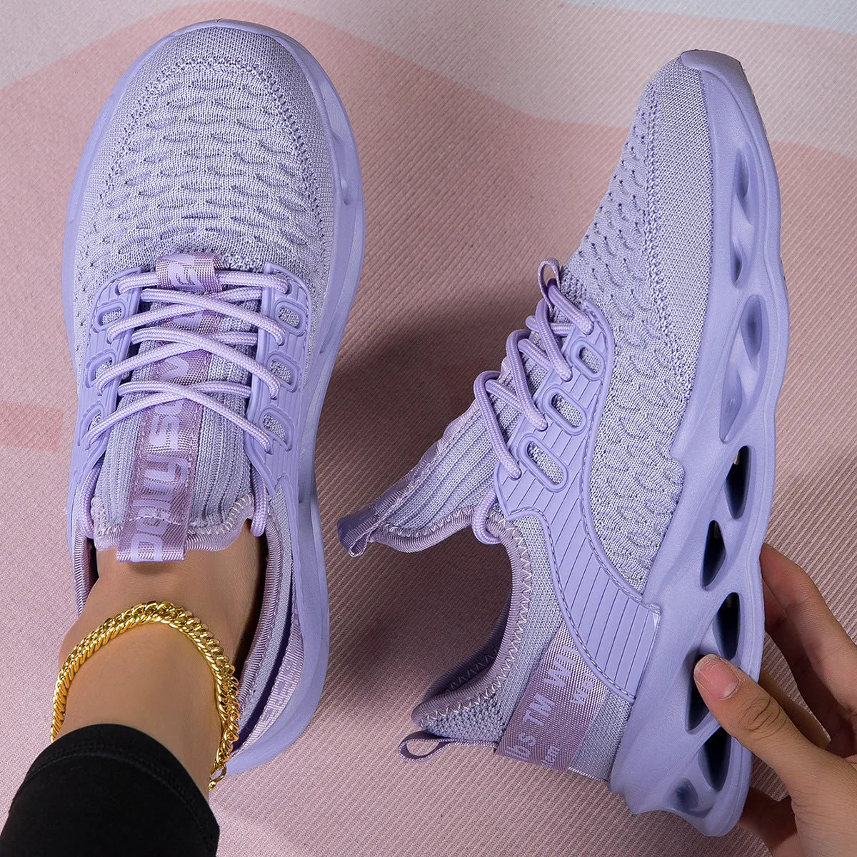 Lightweight lace-up casual shoes with fabric upper and renewable leather sole, in red, white, or purple, sizes 36-44