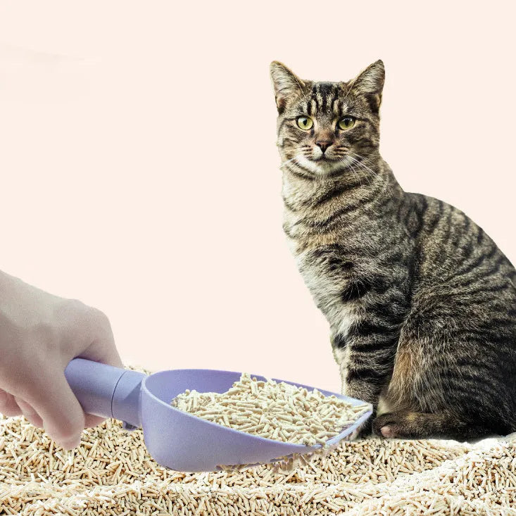 ABS plastic cat litter scoop with base featuring hidden bag storage and wall mounting capability