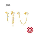 Set of three S925 sterling silver geometric zircon tassel earrings for women on a plain background.