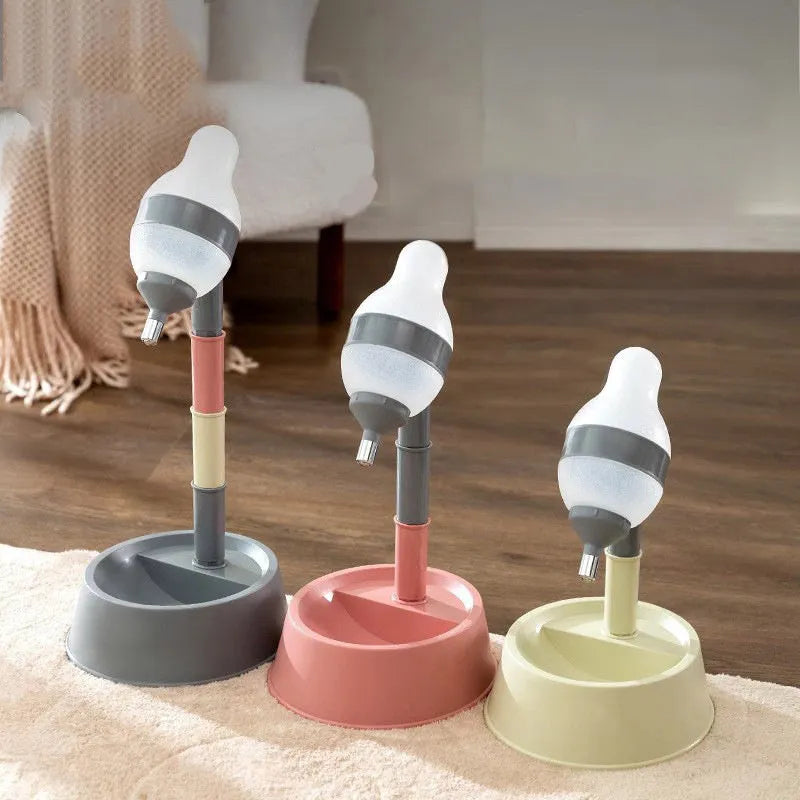 Green adjustable standing water dispenser for pets with detachable pole and ball-tip nozzle on a stable base.