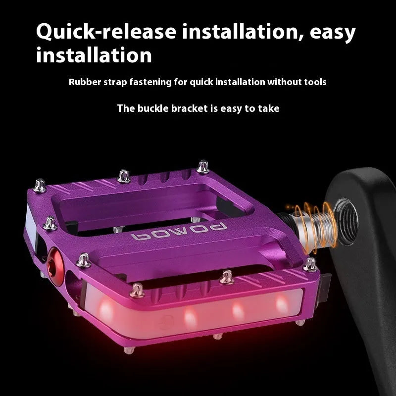Pair of aluminium alloy bicycle pedals with integrated 710 LED lights in a choice of colours.