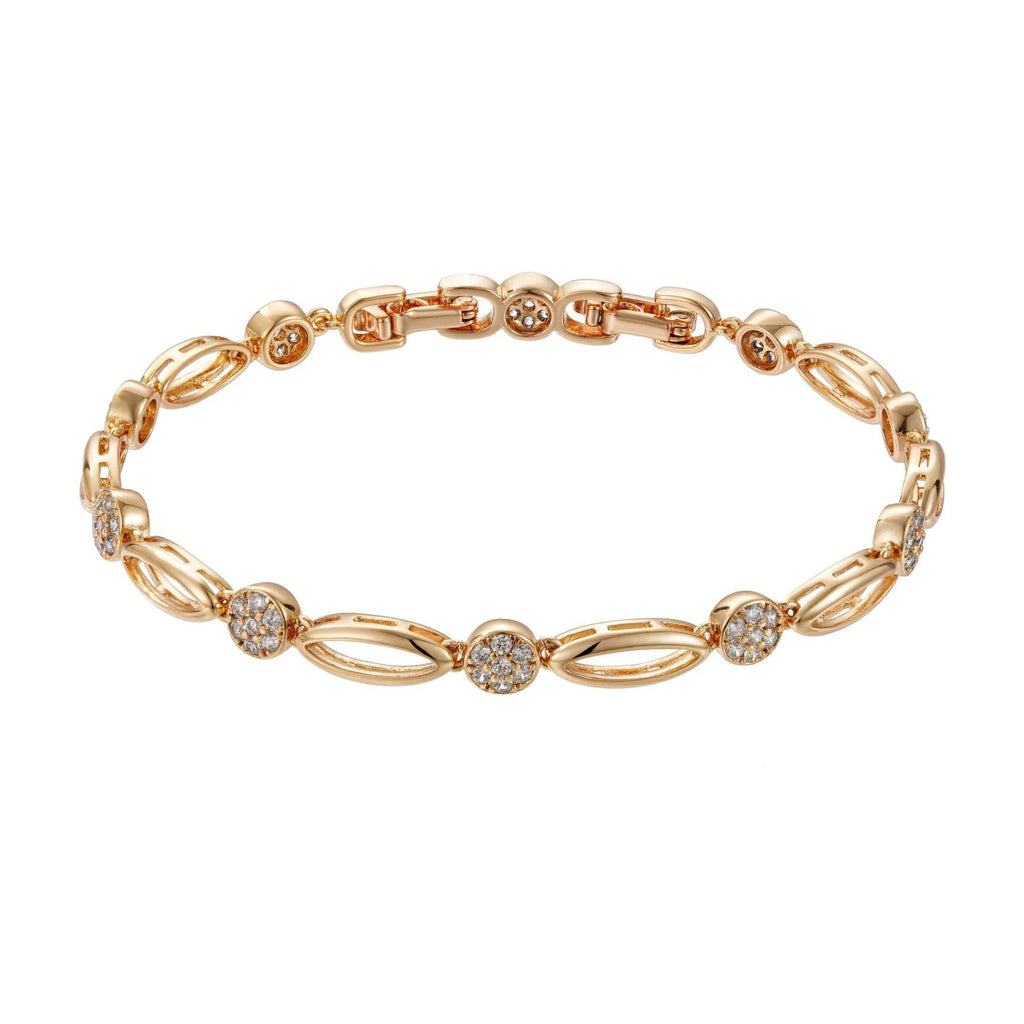 Golden coloured hollow carved copper bracelet with a U-shaped bangle profile on a white background.