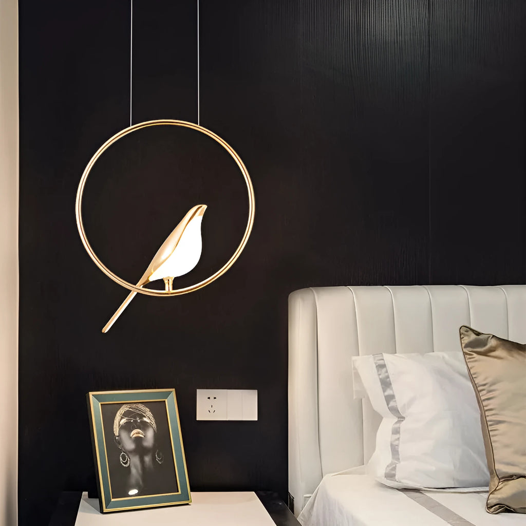Modern silver magpie bird chandelier with long 150cm drop and clear acrylic details, hanging from a ceiling.