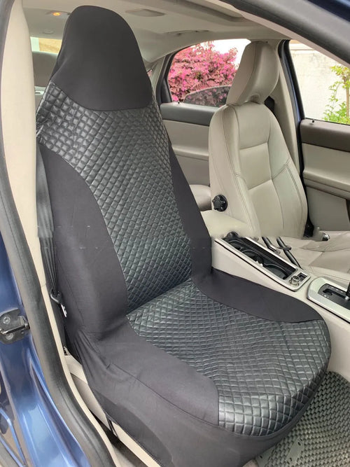 Black quilted automotive seat cover made from PU and polyester fabric, shown with plastic fitting hooks.