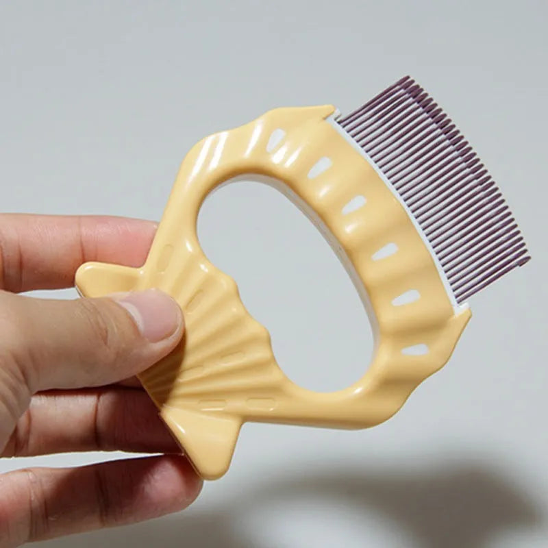 Shell shaped pet grooming brush with wire bristles in green, orange and purple colour options