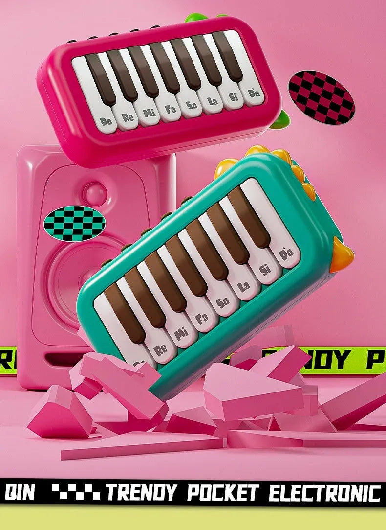 Baby pocket electronic keyboard toy in Little Piano Pattern design, shown in green and pink colour options.