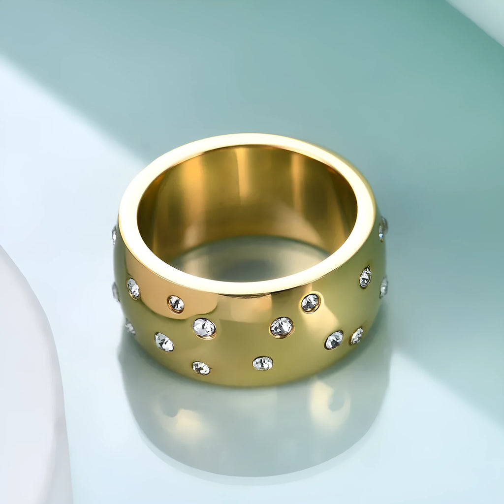 Geometric titanium steel couple ring with diamond treatment, shown in rose gold colour on a woman's hand.