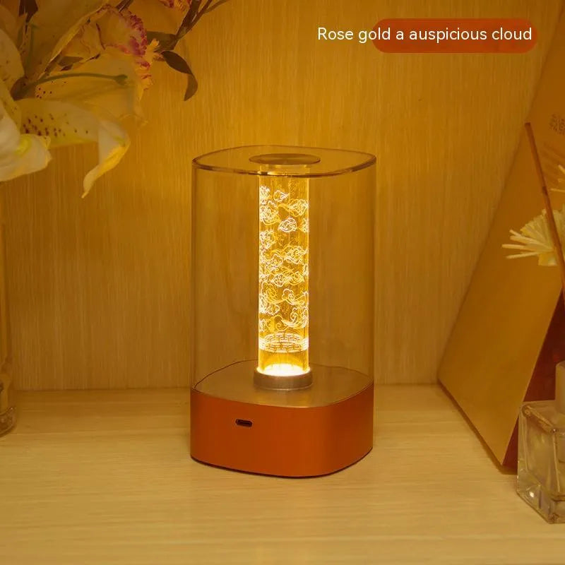 Rose gold USB touch control LED atmosphere lamp with abstract design on wooden surface