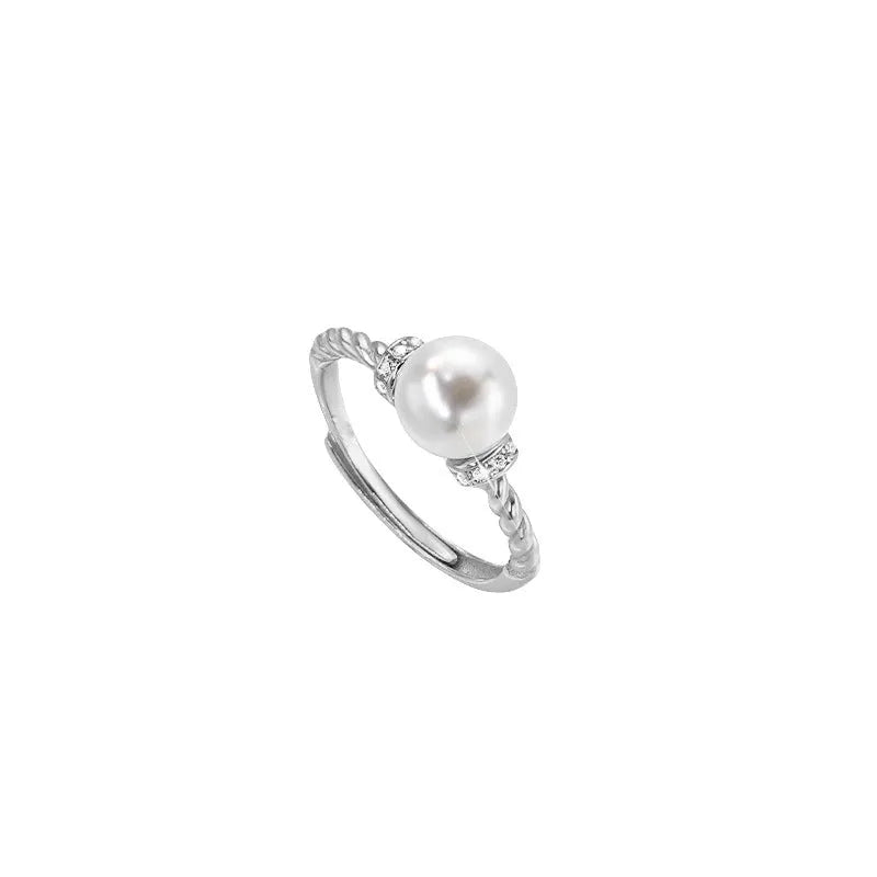 Antique twist pearl ring in copper with adjustable size and geometric design, available in gold or silver colour.