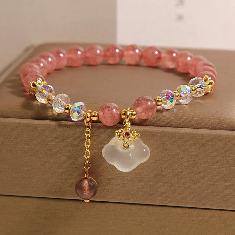 Women's natural crystal bracelet with strawberry quartz beads, white agate beads, and traditional auspicious cloud charm