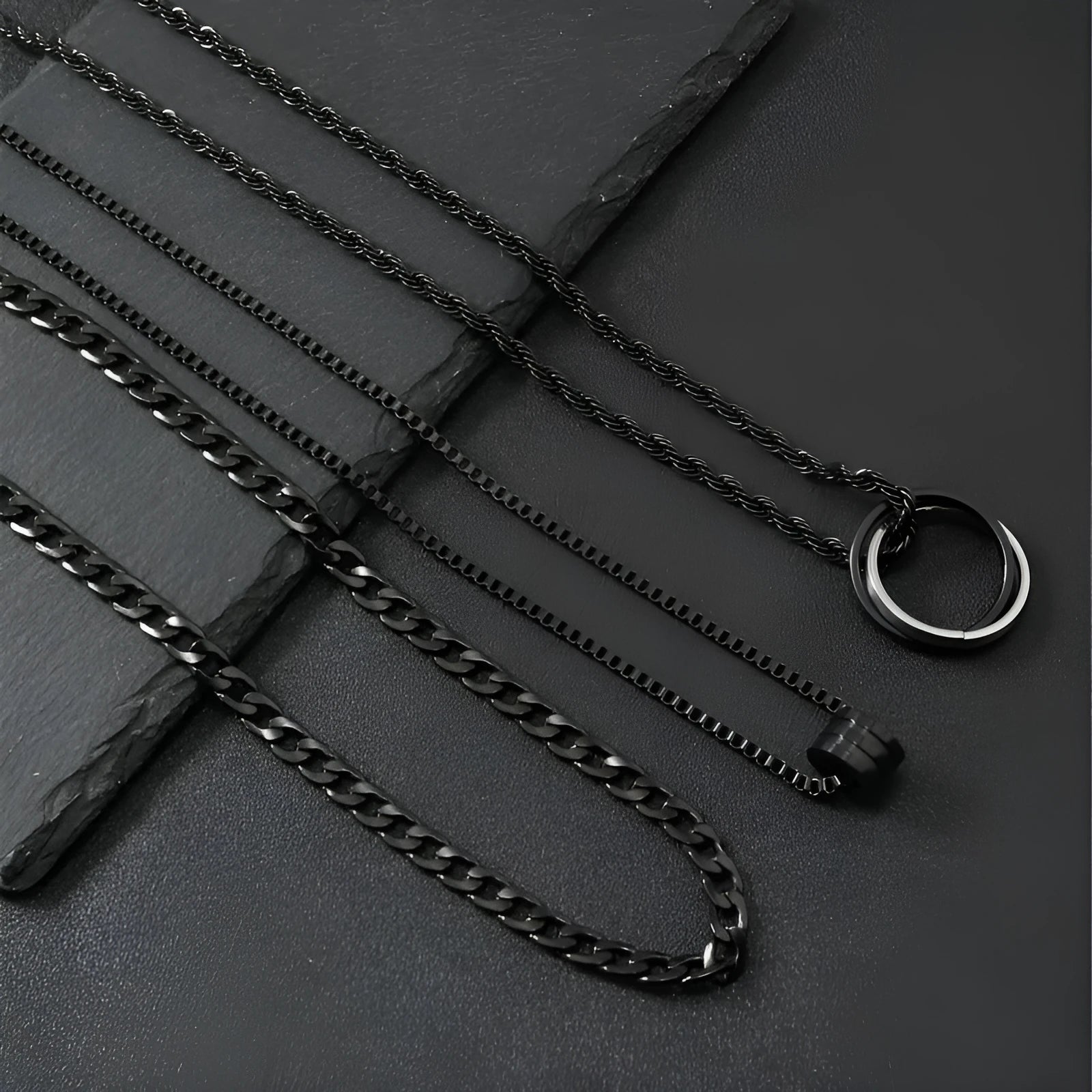 Men's black titanium steel geometric necklace set with three-dimensional cylindrical ring buckles on stainless steel chains