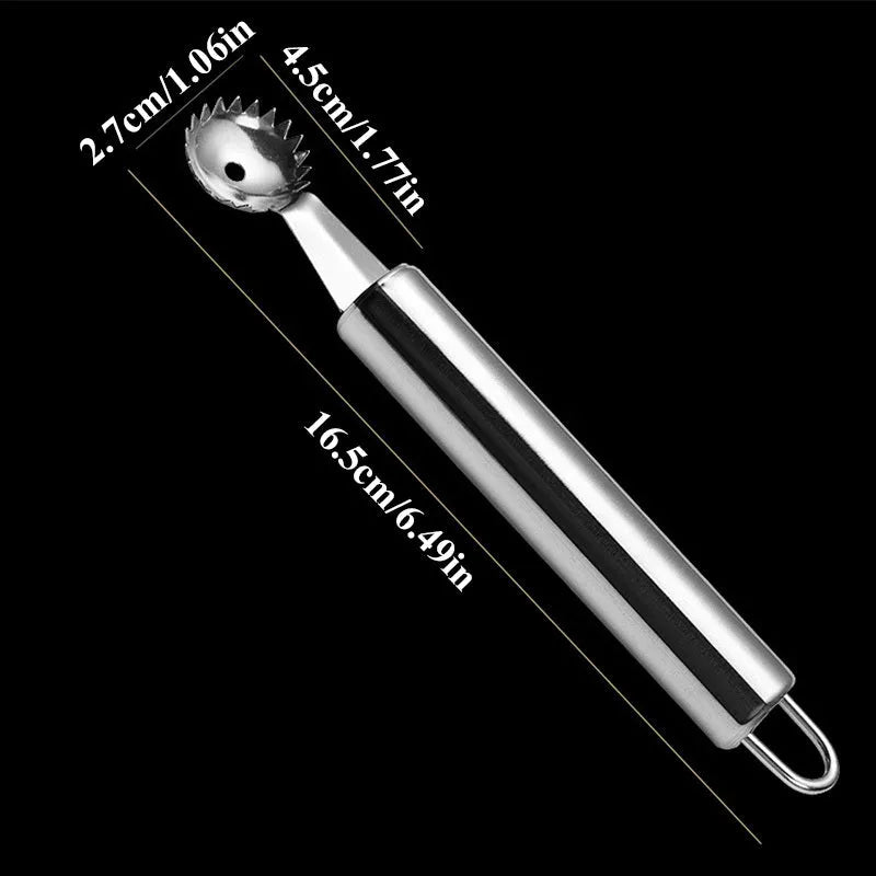 Stainless steel strawberry stem remover on a kitchen counter, modern minimalist design for coring fruit