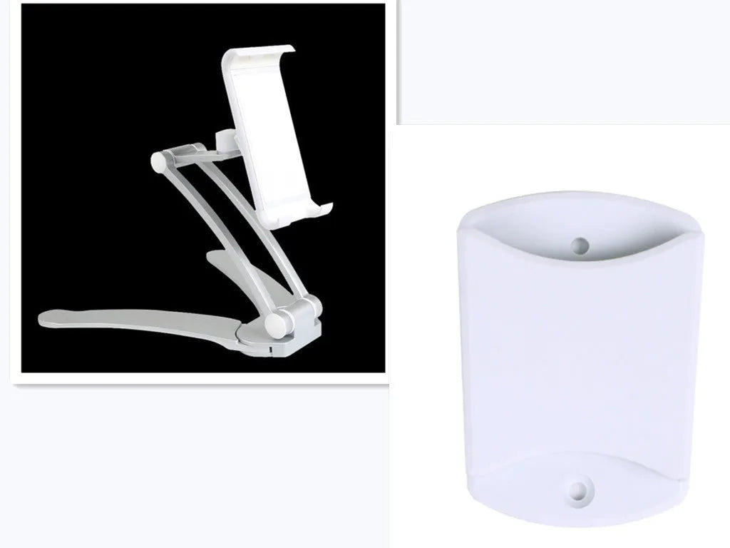 Silver aluminium alloy tablet stand with adjustable black clips holding a tablet, showing 360-degree rotation on a wooden desk.