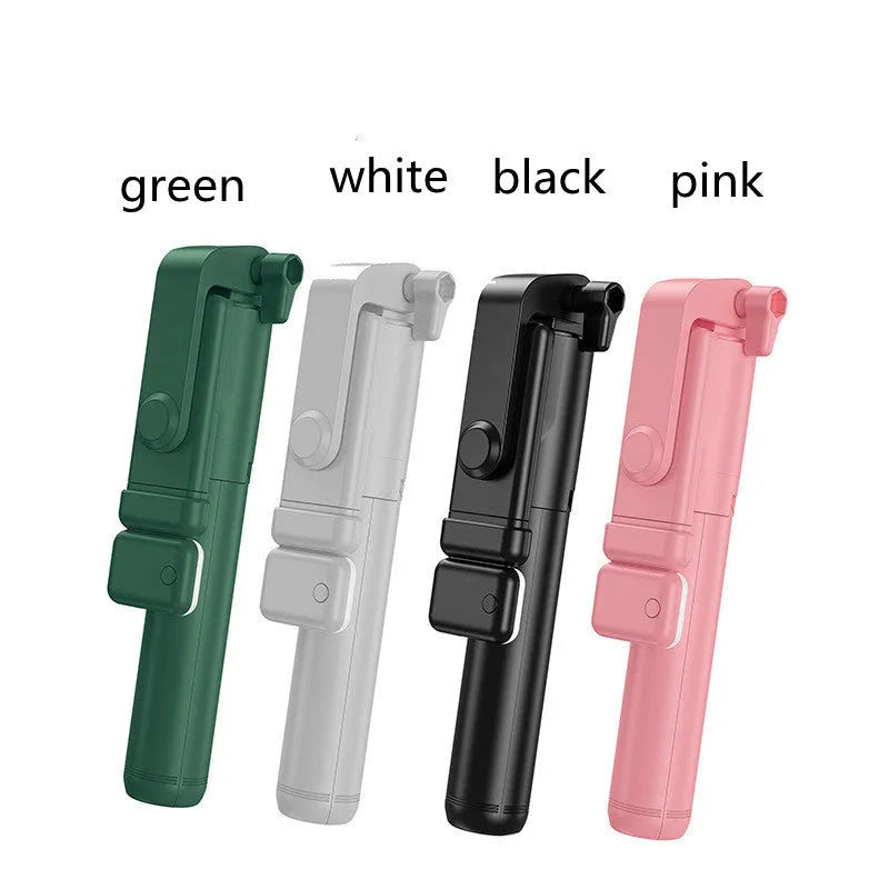 Black Bluetooth selfie stick with extended tripod legs holding an iPhone, showcasing its 360-degree rotating phone holder.