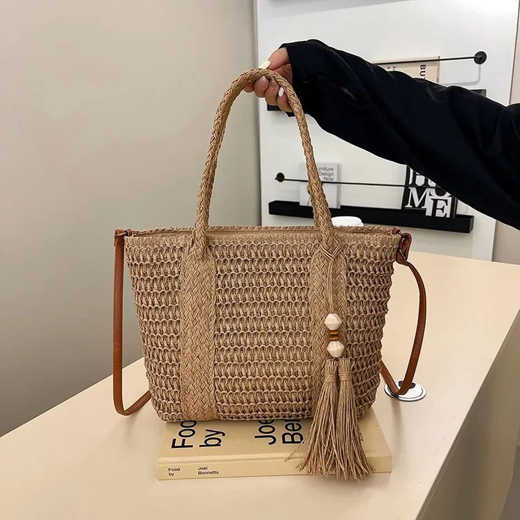 Women's straw woven crossbody shoulder bag showing diagonal weave pattern in milky white colour