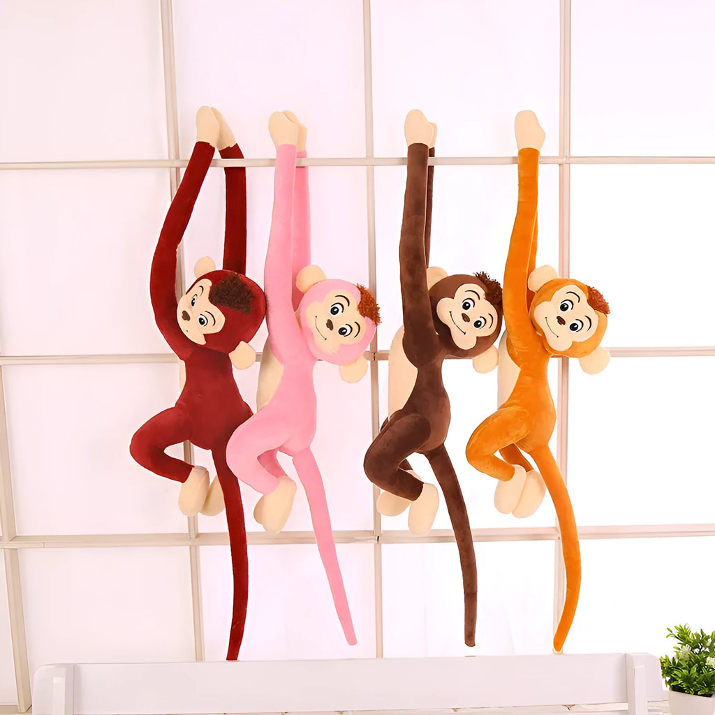 Long arm plush monkey toy hanging over a curtain pole in dark brown colour.