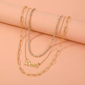 Monogram pendant multi-layer necklace on display showing electroplated zinc alloy chain and personalised initial