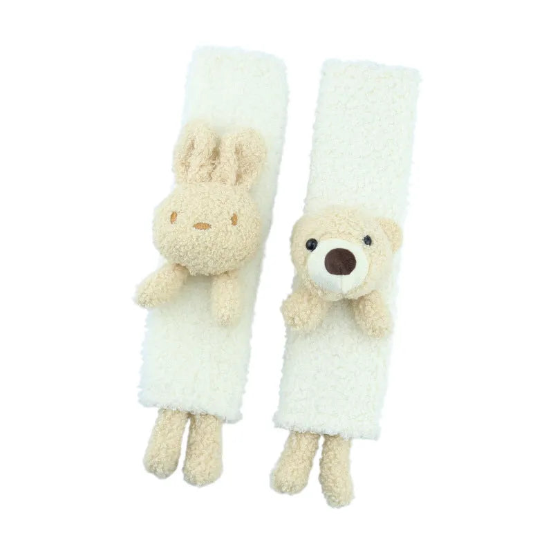 Cartoon plush lamb wool car seatbelt shoulder protector in bear and rabbit designs.