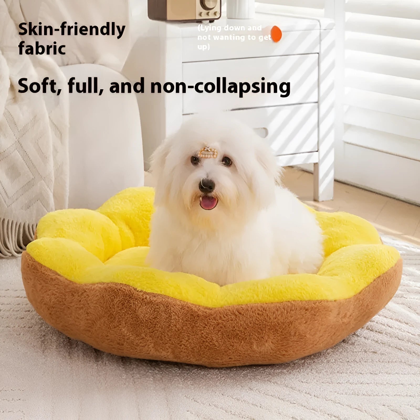 Round plush cat bed with detachable inner nest in grey and black, showing raised sides and soft texture.