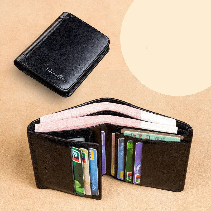 Men's black full-grain leather bifold wallet showing open interior with card slots and an exterior zippered coin pouch.