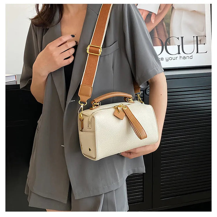 PU leather shoulder messenger bag with outer slit pocket and crossbody strap in black colour