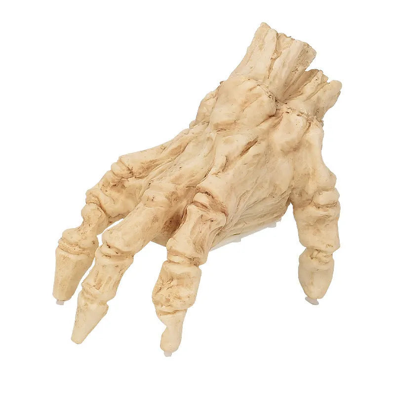 Halloween electric luminous crawling hand on floor, glowing warm colour, vinyl zombie hand with spooky sound