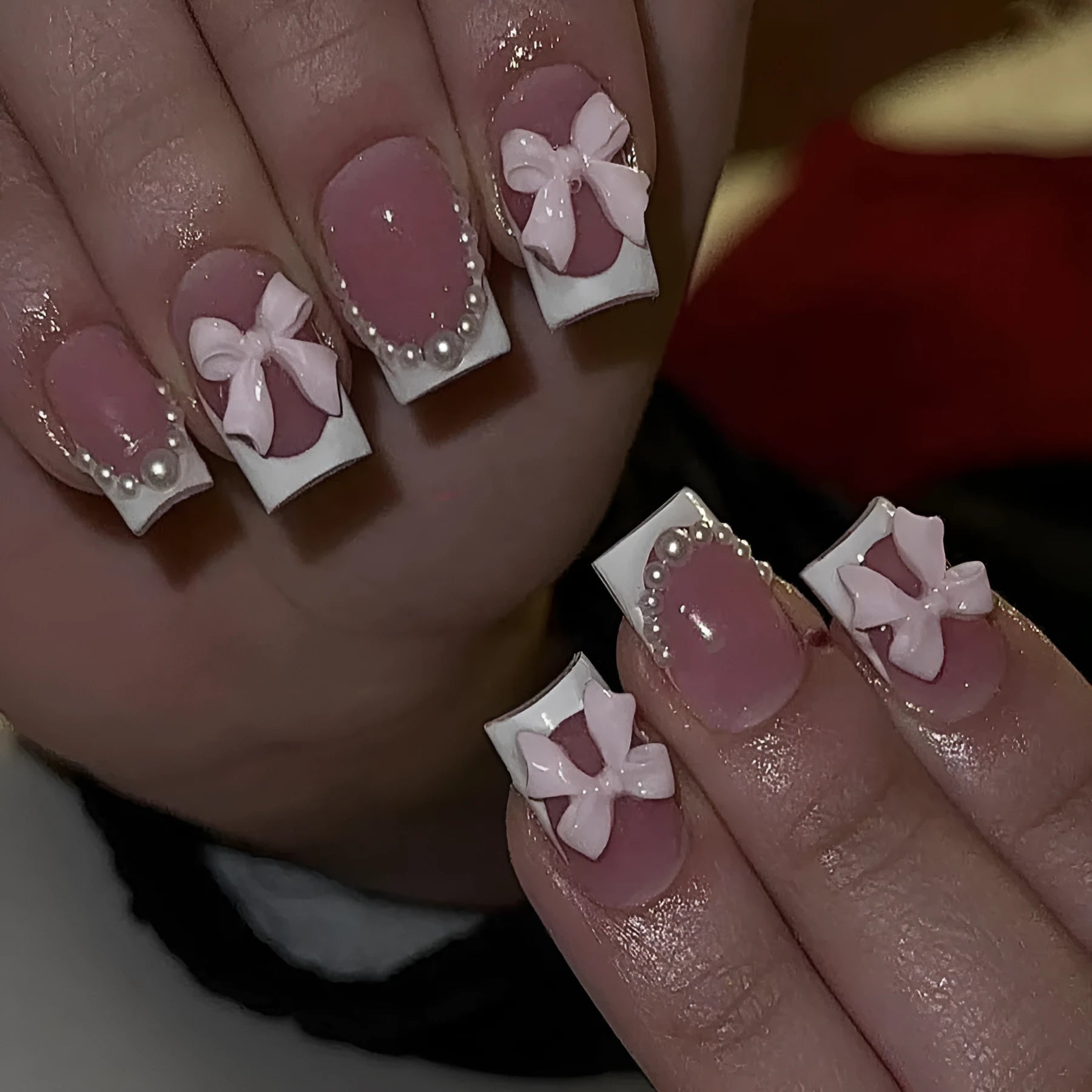 Set of 24 short square nail wraps with French tips and bow, tulip, and starry sky designs on a backing card.