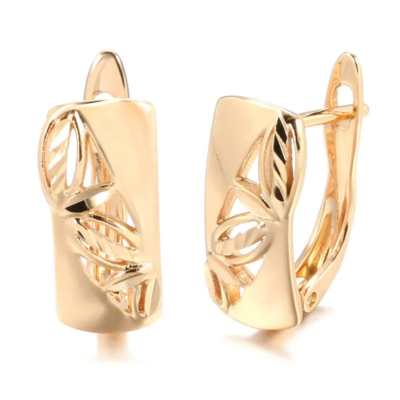 Hollow-carved floral copper earrings with smooth surface and U-shaped design in H0147 colour