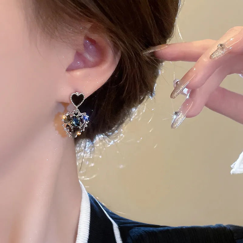 Black light luxury crystal heart-shaped Mosquito Coil ear clips for women, metal construction