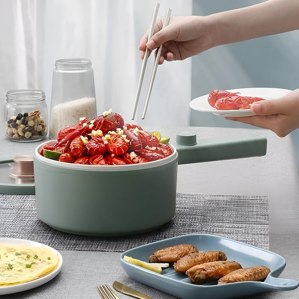 White and green portable electric cooking pot with multi-function controls and international plug