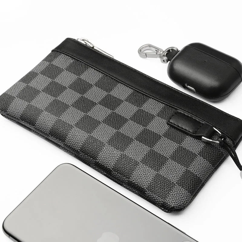 Black plaid clutch style men's leather wallet made from genuine cowhide, shown closed.
