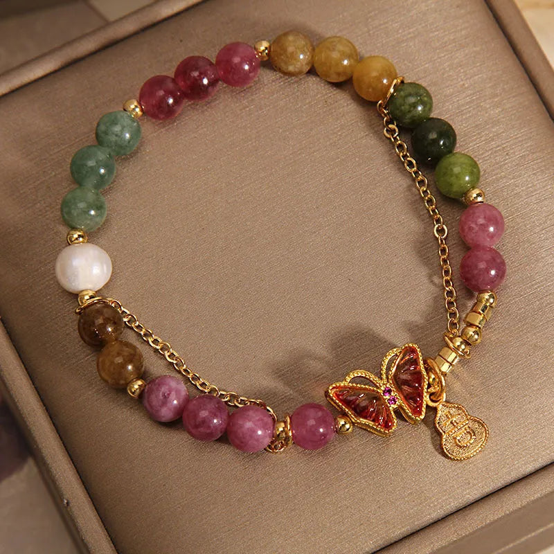 Natural jade coloured tourmaline butterfly agate bracelet for women showing pendant detail