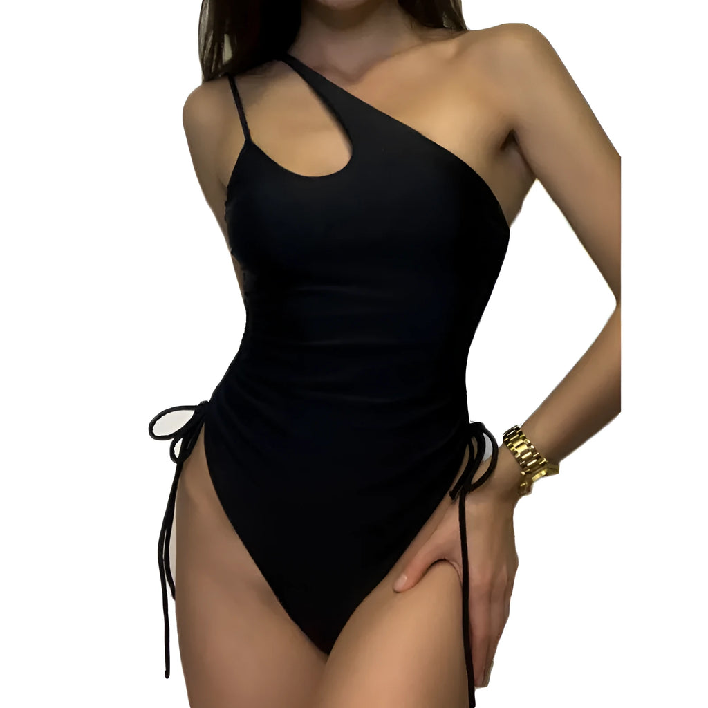 Black tight-fitting sleeveless women's dress with lacing detail and sloping shoulders.