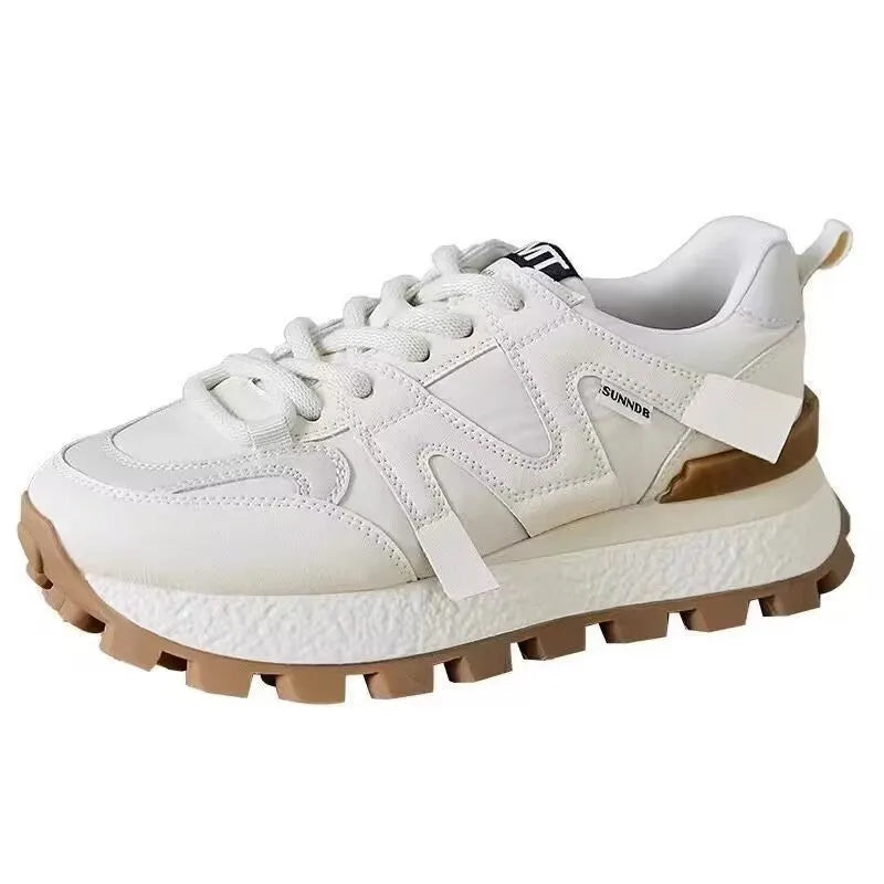 Women's casual platform sneaker in Milky White with front lace-up, flat heel, and round toe
