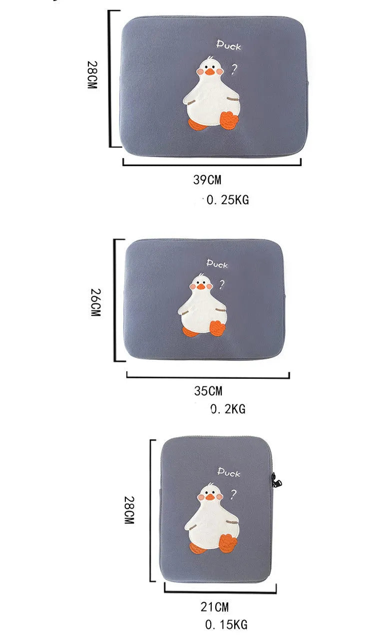 Blue cotton tablet case with embroidered cartoon duck design and a silver zipper.