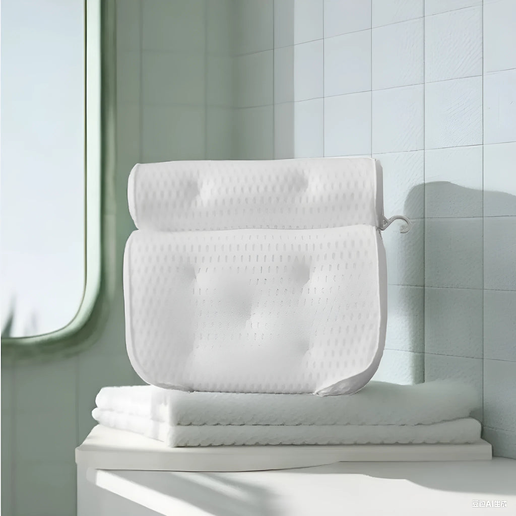 White bathtub pillow with 3D mesh fabric and suction cups on a tub surface.